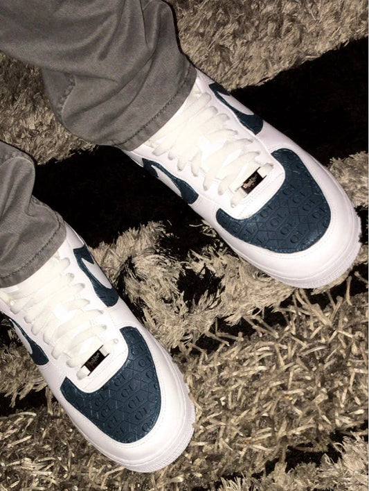 OneKind Embossed Leather Sneakers